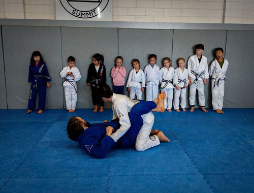 Kids watching jiu jitsu